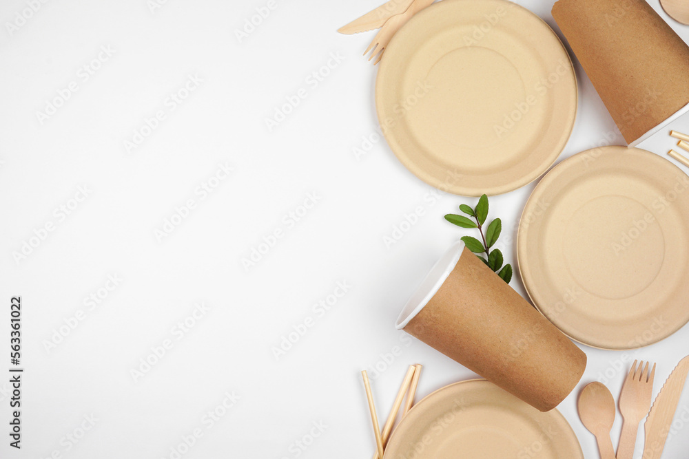 Eco friendly disposable dishware for takeout. Side border on a white ...