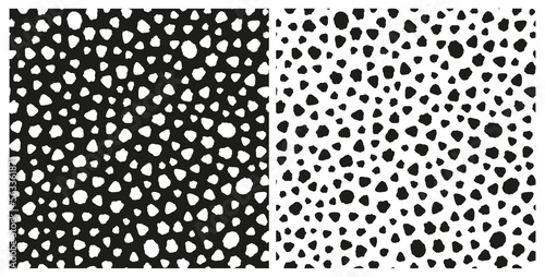 Set of abstract irregular dotted seamless repeat pattern. Random placed, vector all over minimal surface print in black and white.