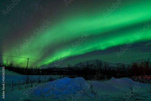 northern lights aurora borealis lapland night landscape winter photo