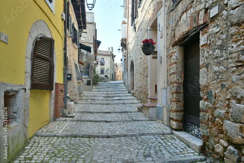 Fototapeta Naklejka Na Ścianę i Meble -  A narrow street in the historic center of Priverno, an old village in Lazio, not far from Rome, Italy.