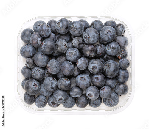 Whole fresh blueberries, in a clear plastic punnet, from above. Dark blue colored, ripe, raw fruits of Vaccinium corymbosum, berries of the northern highbush blueberry. Isolated, close-up, food photo. photo