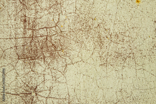 Old cracked paint in craquelure on a rusty metal surfaceGrunge rusted metal texture. Rusty corrosion and oxidized background. Worn metallic iron rusty metal background.