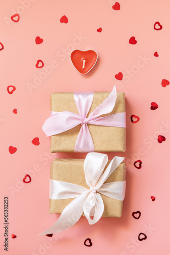 Valentine's Day background with gifts and hearts. Greeting card Valentine's day, Womans day, wedding, birthday or mothers day. View from above.