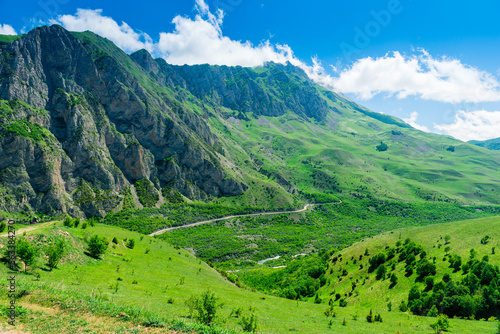 Green valley on the site of the collapsed Kolka glacier. Karmadon Gorge in the mountains of the North Caucasus. Russia © kosmos111