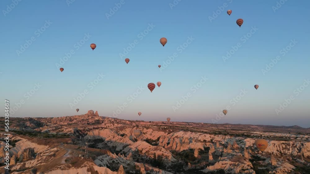 Incredible sunrise and balloons over the hills in Cappadocia. The view from the drone.