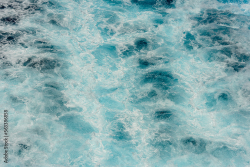 Boat wake on the ocean, blue, foam