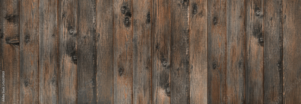 Naklejka premium brown old wooden background. Vintage Wooden Dark Vertical Boards