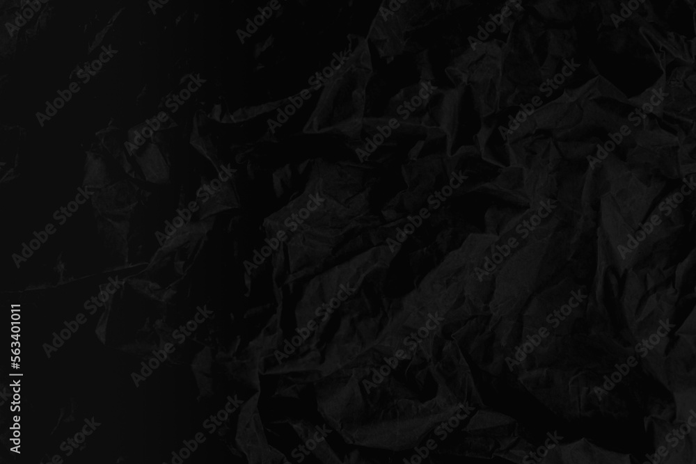 Black paper texture background, crumpled pattern, blank crumpled black paper. Black paper texture background, crumpled pattern, blank crumpled black paper.