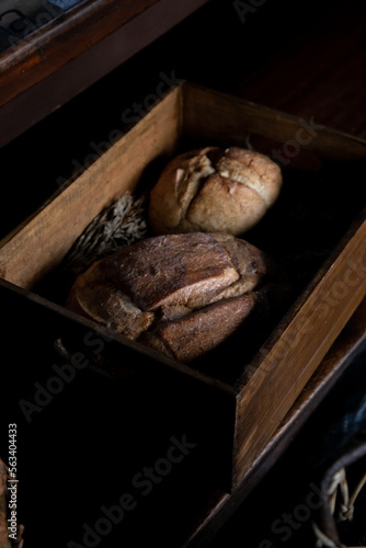 Fresh bread in a wooden tray