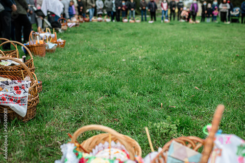 Parishioners of the church at the church service on the day of the right-wing Easter with baskets of food in anticipation of the consecration of Easter cakes and eggs.