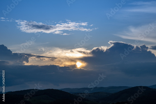 Sunset landscape view of the mountains of Petropolis, Rio de Janeiro from a neighborhood in Areal, Brazil, with sky copy space