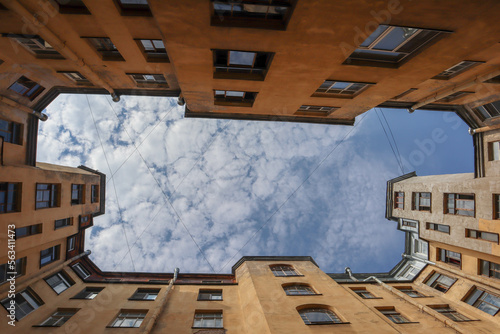 piece of the blue sky with clouds in iconic famous yard-well in Saint Petersburg, Russia