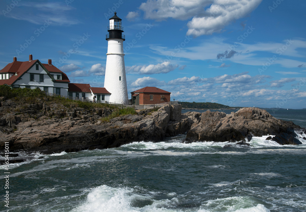 Rolling Clouds and Surf at Portland Head Lighthouse along Rocky Coast in Maine