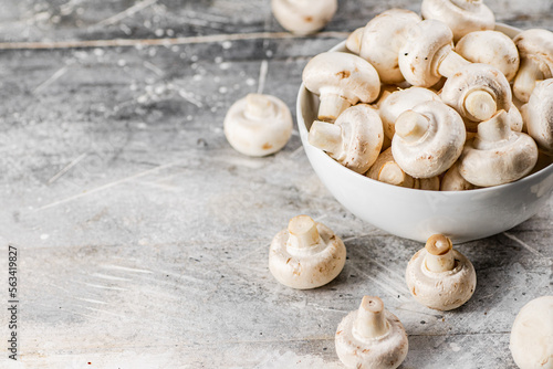 Full bowl with mushrooms on the table. 