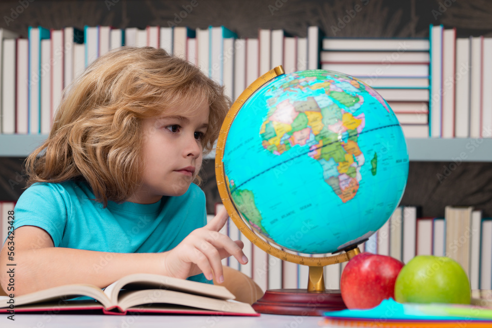 Back to school. Funny little child from elementary school with book. Education. Kid study and learning.