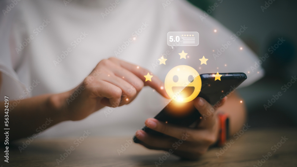 © FAMILY STOCK - hand touching on five star icon and happy smile face for feedback review satisfaction service, Customer service experience and business satisfaction survey. © FAMILY STOCK - hand touching on five star icon and happy smile face for feedback review satisfaction service, Customer service experience and business satisfaction survey.