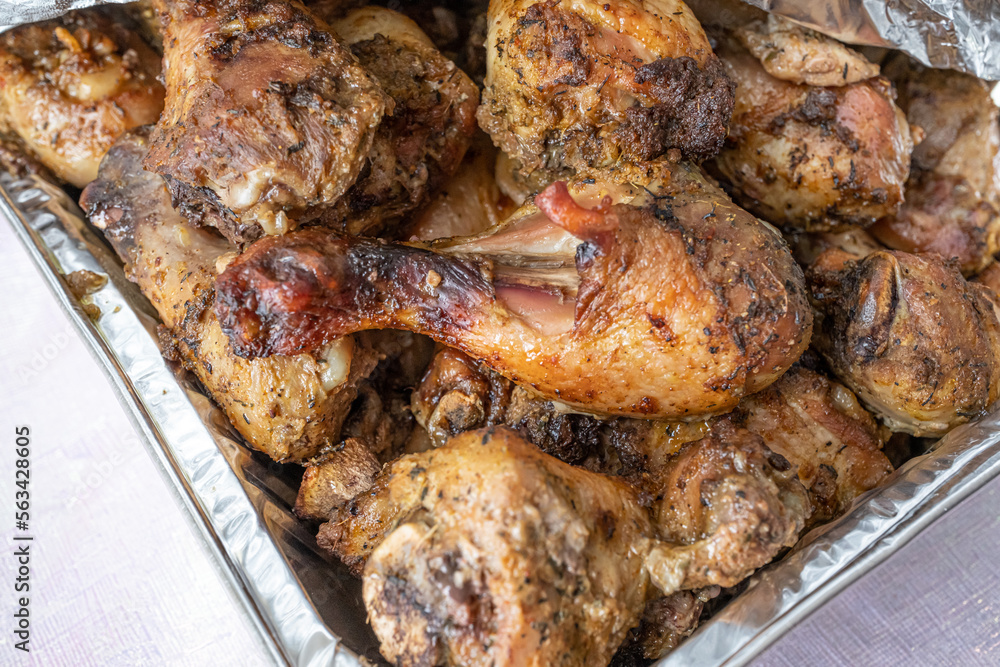 grilled chicken thighs ready to eat at a party grilled chicken thighs ready to eat at a party