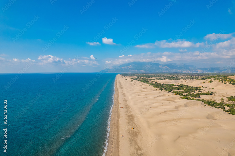 Beautiful Patara sandy beach with blue sea Kalkan, Antalya Turkey. Aerial top view from drone
