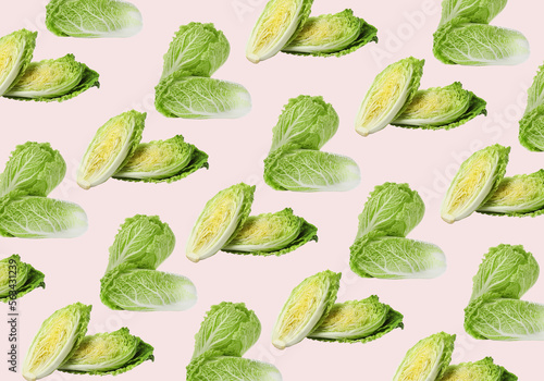 Pattern design with fresh Chinese cabbages on pale light pink background © New Africa