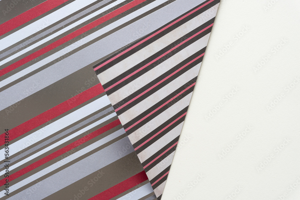 Obraz premium folded scrapbook paper with decorative striped patterns and blank space
