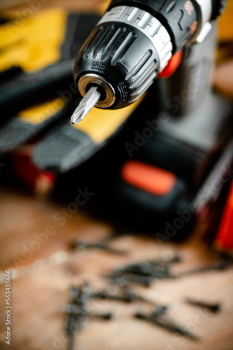 Working tool. Screwdriver. On a wooden background.