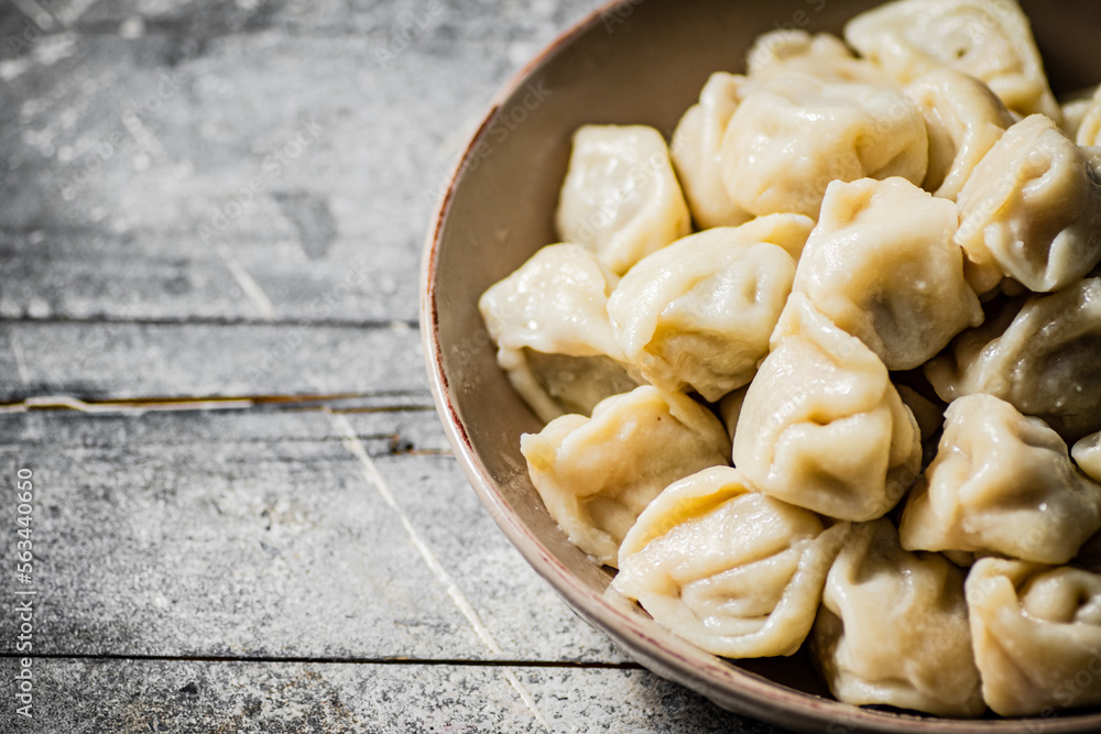 Boiled homemade dumplings on a plate. 