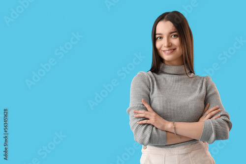 Young woman in grey sweater...