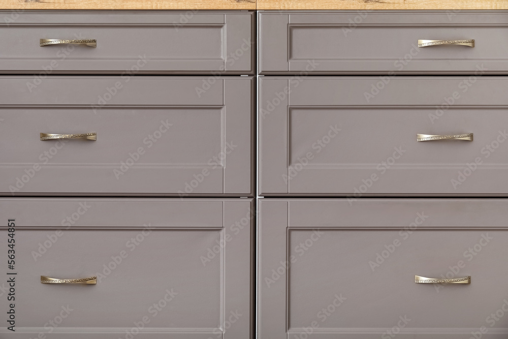 Grey counters with drawers in modern kitchen, closeup Grey counters with drawers in modern kitchen, closeup