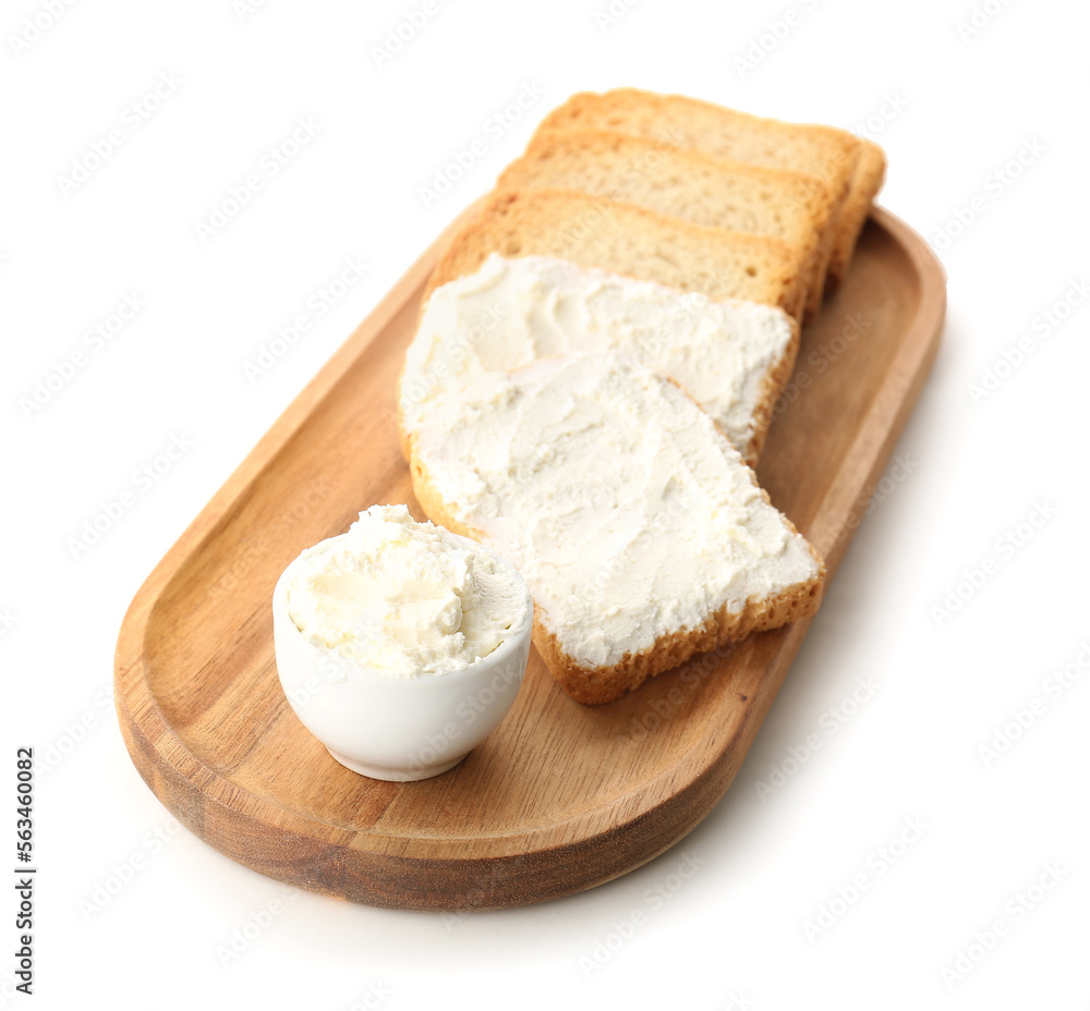 Wooden board with bread rusks and cream cheese on white background