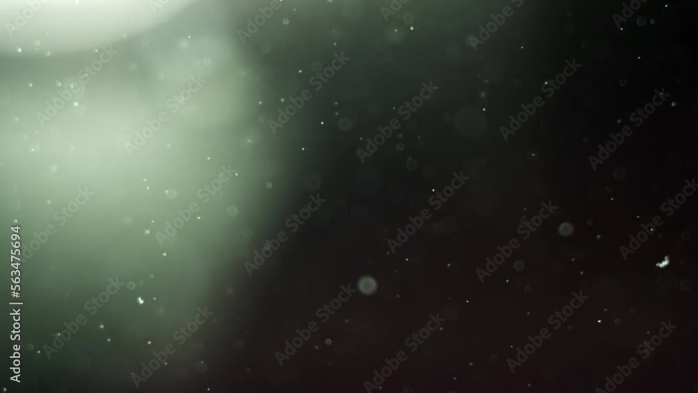 Abstract background with animation of flying and flickering particles ...