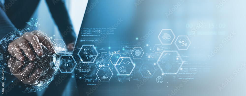 Computer programmer working on laptop with global business network and ...