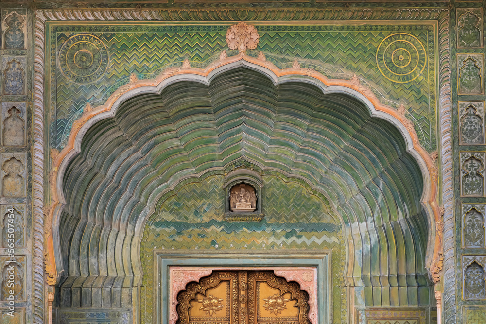 Historic ornate door architecture of City Palace in Jaipur, Rajasthan, India