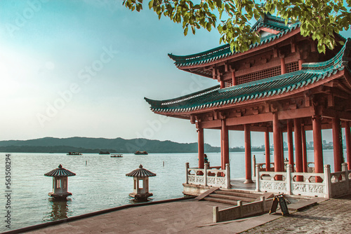 Xiying Pavilion and West Lake in sunny day. Xiying Pavilion is a popular scenic spot to view Leifeng Pagoda standing in the sunset