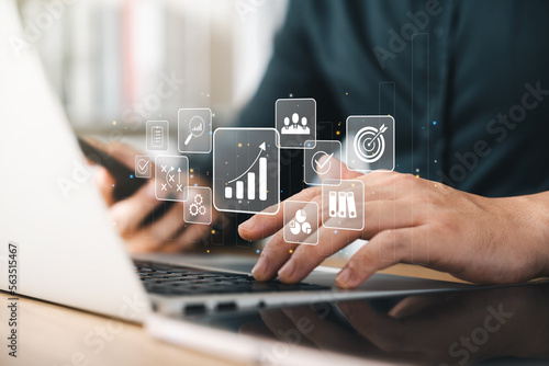 concept of long-term business development and management Executives looking at virtual screens business graph icon Goal setting, problem-solving, workflows, optimal business operations and innovation.