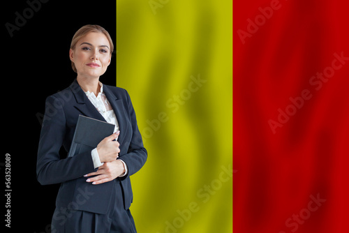 Belgium businesswoman on the flag of Belgium digital  nomad, business, startup concept photo