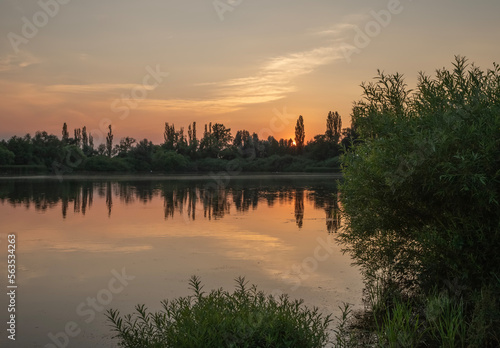 Scenic View Of Lake Against Sky During Sunset © Kateryna