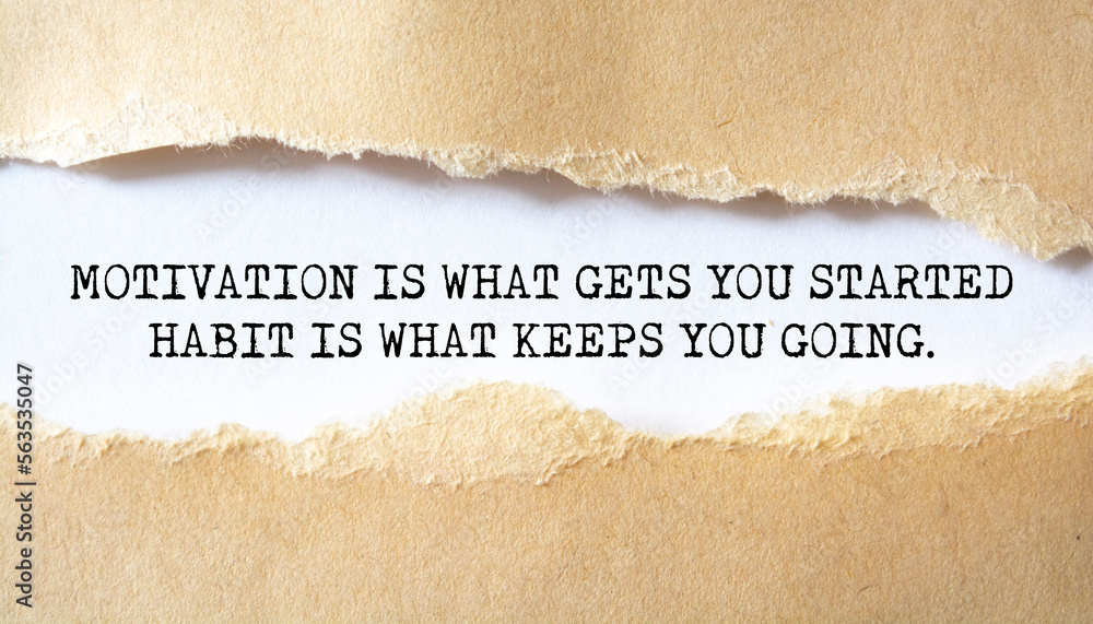 Motivation is What Gets you Started Habit Is What Keeps You Going word written under torn paper.