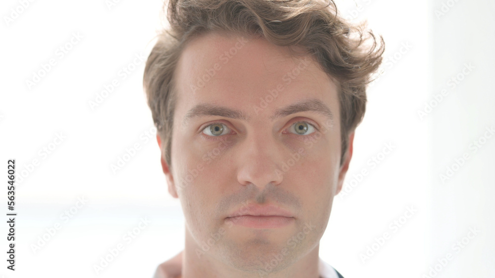Face Close Up of Serious Young Man Face Close Up of Serious Young Man