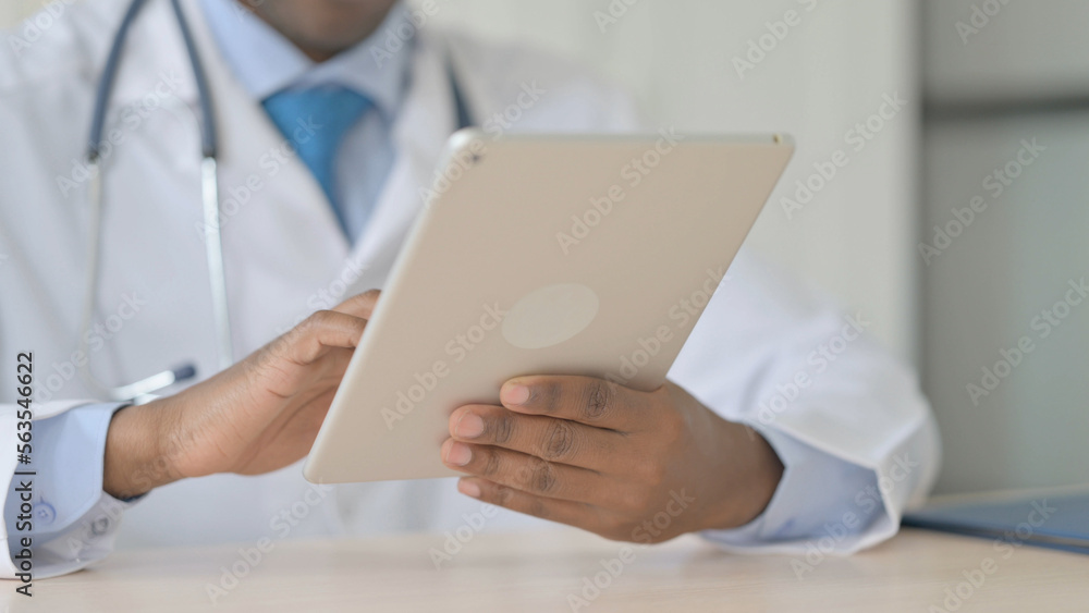 African Doctor using Tablet for Work African Doctor using Tablet for Work