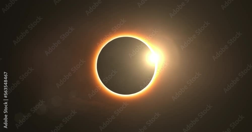 Total solar eclipse with diamond ring effect. The moon passes between the Sun and the Earth