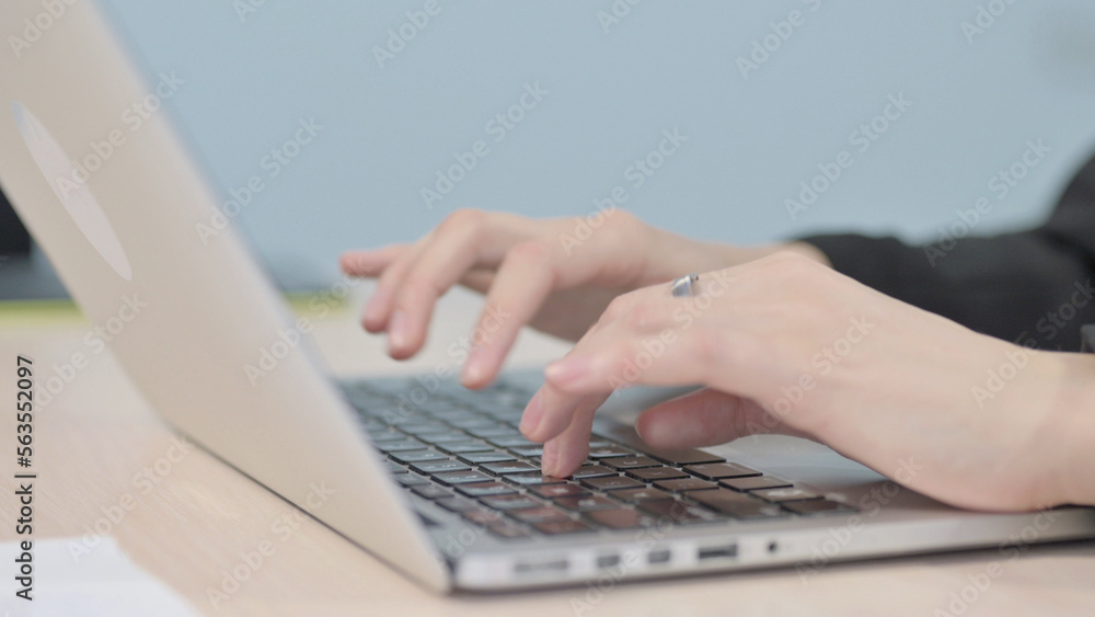 Close up of Hands Typing on Laptop Close up of Hands Typing on Laptop