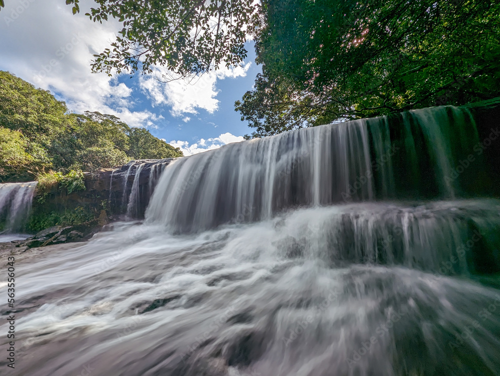 waterfall in the forest in Ishigaki, Okinawa, Japan waterfall in the forest in Ishigaki, Okinawa, Japan