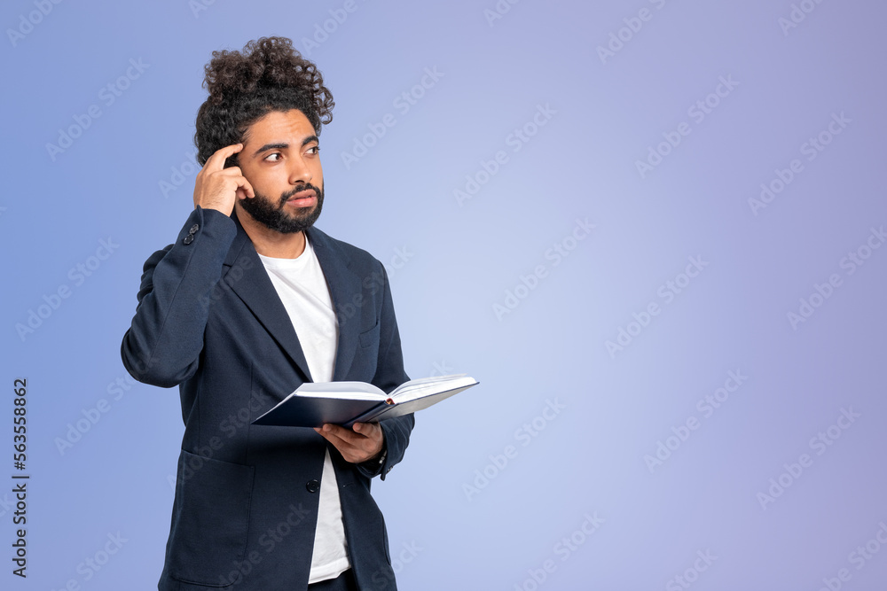Handsome middle eastern arab businessman in formal wear touches