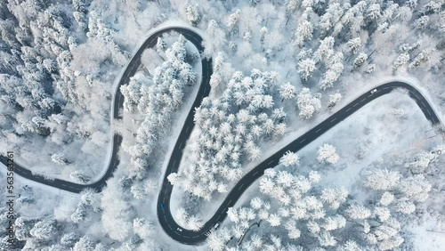 windy road in winter with snow aerial