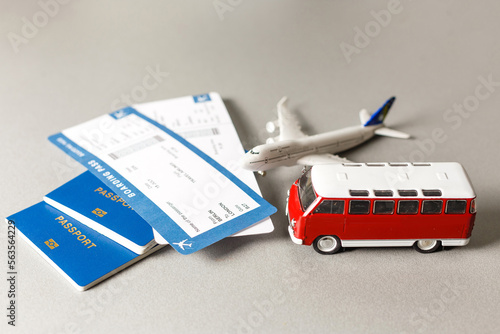 Passport and plane with holiday travel ideas.