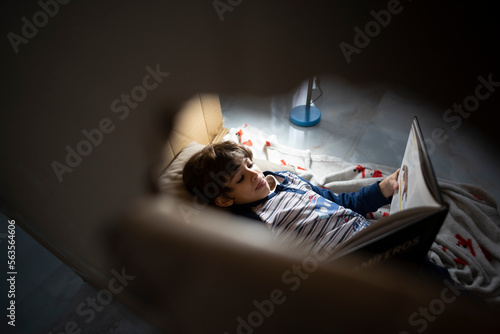 fun in a box: child read book inside a box