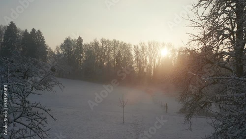 silhouette of a person walking in the snow