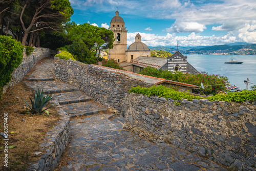 San Lorenzo church and paved walkway in Portovenere, Liguria, Italy photo