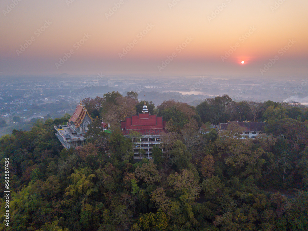 Sunrise from Wat Phra That Doi Khao Khwai temple in Chiang Rai province, Thailand