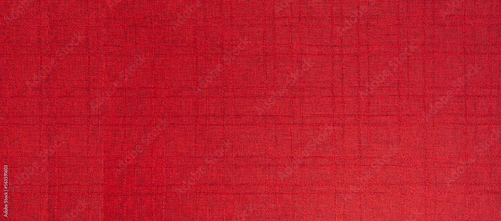 Fototapeta premium Red rough linen fabric texture, background banner with copy space for advertising shopping, sales, cooking, menu. Perfect for Valentine's day, Christmas and New Year time, any special occasion.